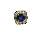 Bague or gris ornée d'un saphir central et de 10 diamants