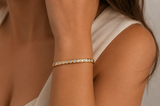 Bracelet jonc ovale articulé or jaune 750 avec ses 12 diamants