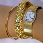Montre Movado or jaune 750 et diamants