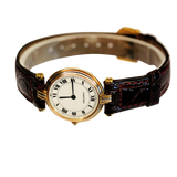 Montre vintage Cartier avec bracelet en cuir