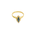 Bague or jaune 750, 8 diamants et un saphir