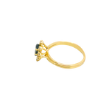 Bague or jaune 750, 8 diamants et un saphir