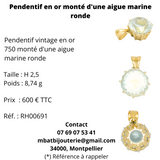 Pendentif en or 750 monté d'une aigue marine ronde