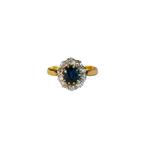 Bague or jaune 750, 10 diamants mettant en valeur un saphir