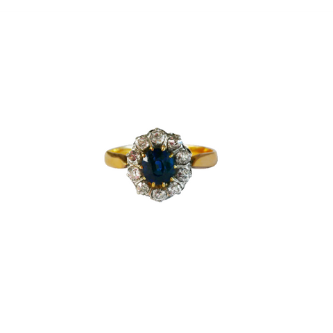 Bague or jaune 750, 10 diamants mettant en valeur un saphir