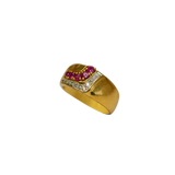 Bague or jaune 750 avec pierres rouges