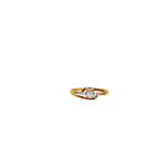 Bague or 9k originale avec un brillant entouré d'autre petits brillants